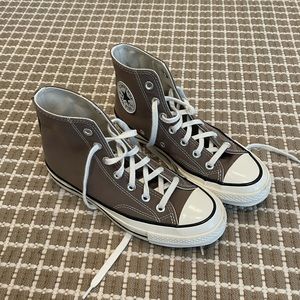 Gray Converse high top Chuck Taylor sneakers in excellent condition. Worn twice!